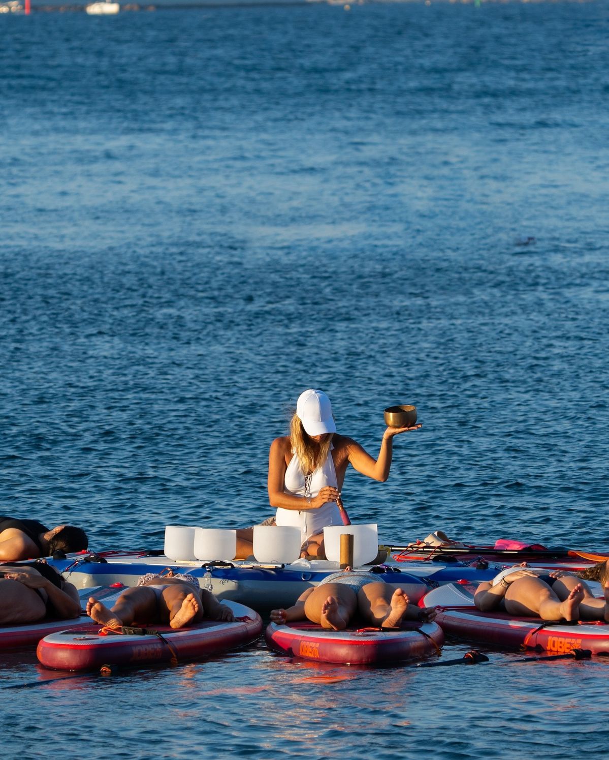 Outdoor breathing and stretch session by mountain lake